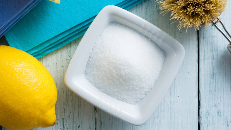 citric acid, lemon, and cleaning tools and materials