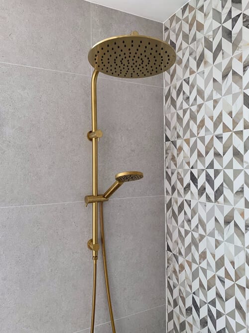 clean shower grout with two different types of tile