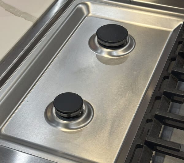 clean stainless stove cooktop