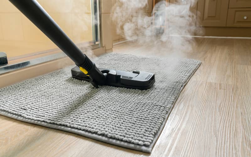 cleaning bathroom mat using a steam mop