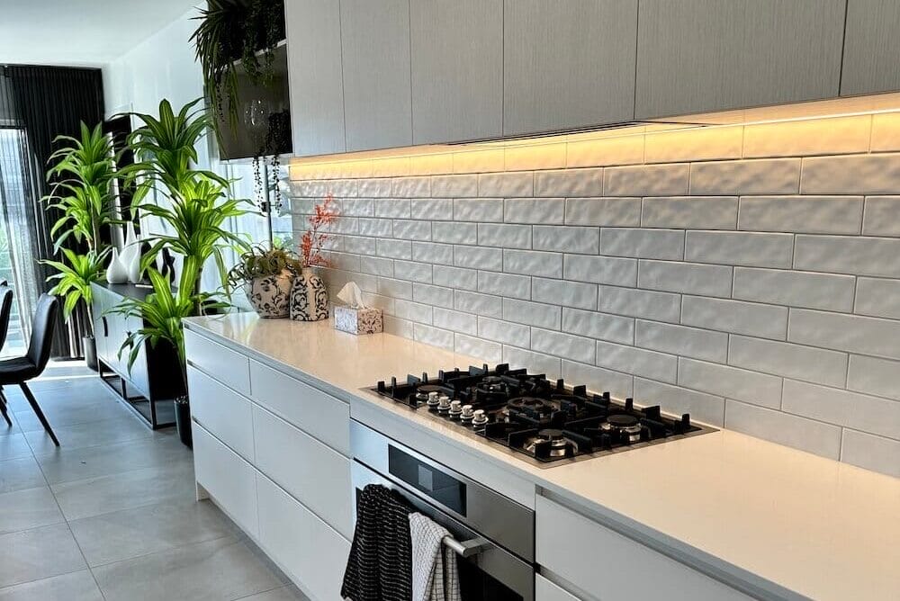 clean kitchen cabinets above stove top