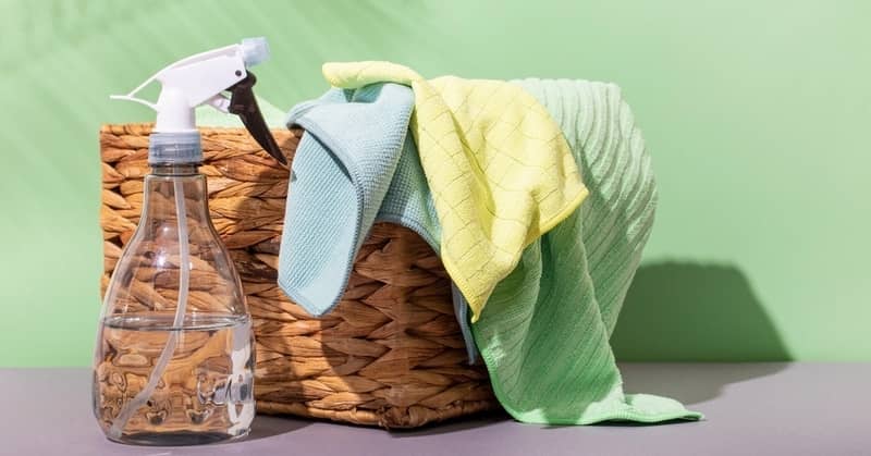 Microfiber cloths for cleaning and a spray bottle 