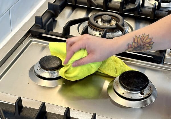 cleaning the cooktop surface