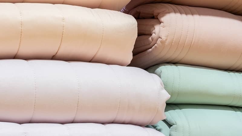 colorful stack of weighted blankets