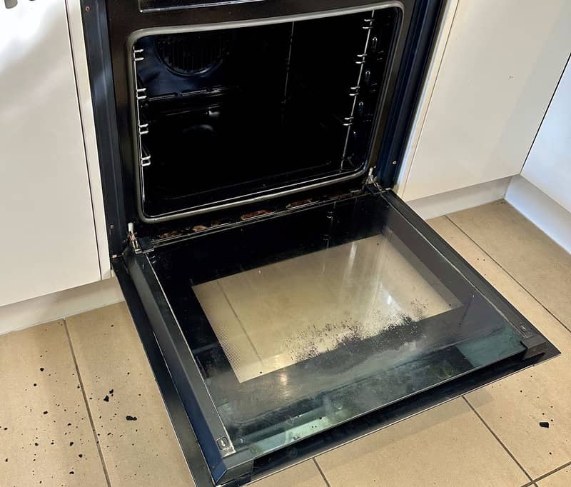 dirty glass oven door