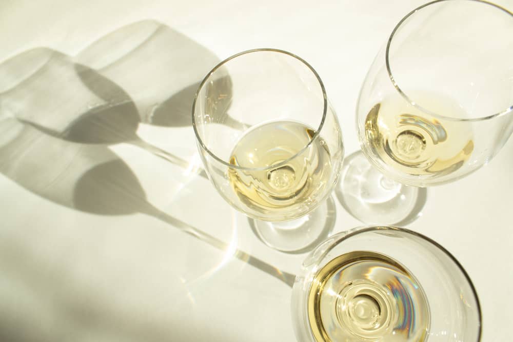 white wine on glasses