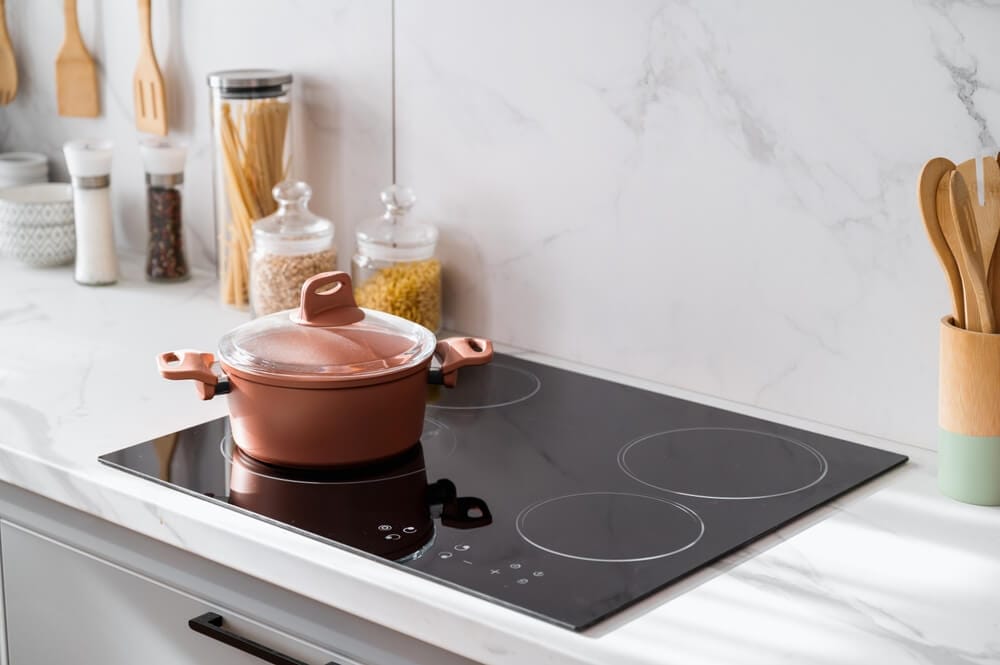 Clean electric stove top with ceramic pot