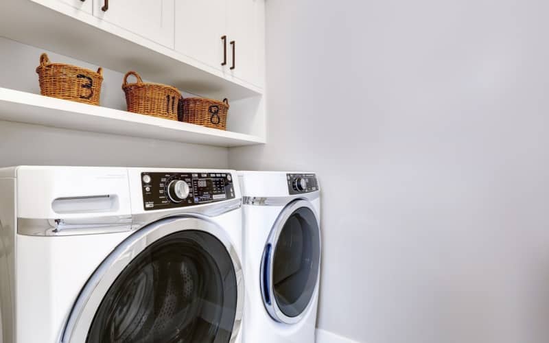 laundry room with a washing machine at home