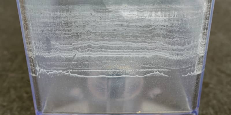 Limescale on plastic water tank from coffee machine