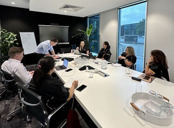 Maid2Match team meeting in Brisbane to discuss cleaning equipment and supplies