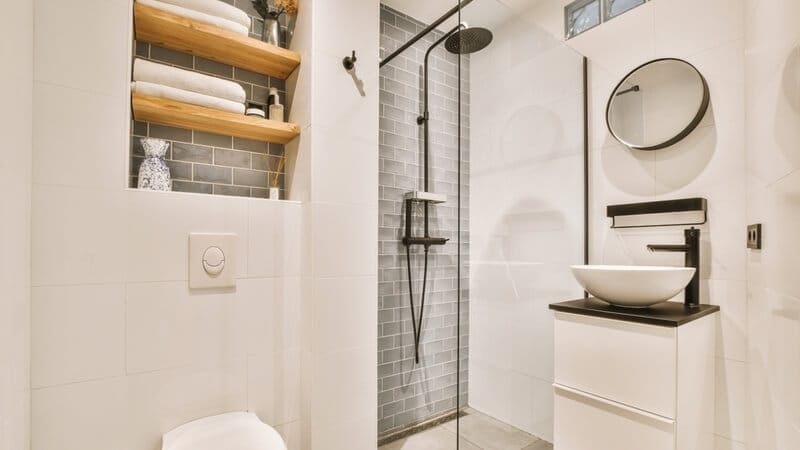 Small bathroom with a shower head