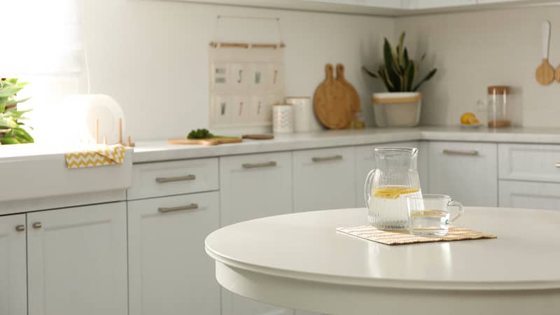 White round table in kitchen. Stylish interior design.