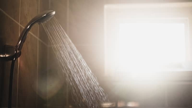 Simply run a hot shower for 5–10 minutes so steam builds up. It will loosen the dirt and grime, which you can rinse away.