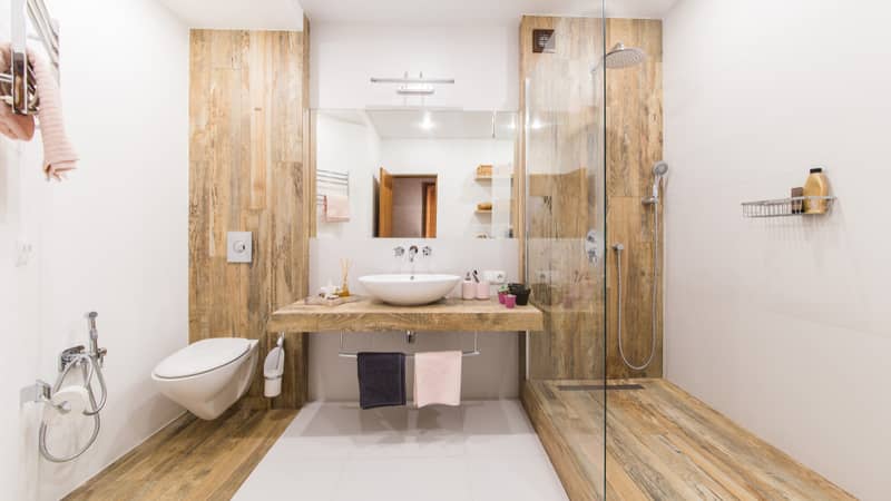 Modern bathroom interior combined with toilet.