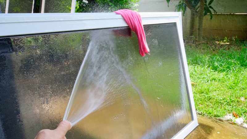 Washing with water and cleaning from dust mosquito net. 