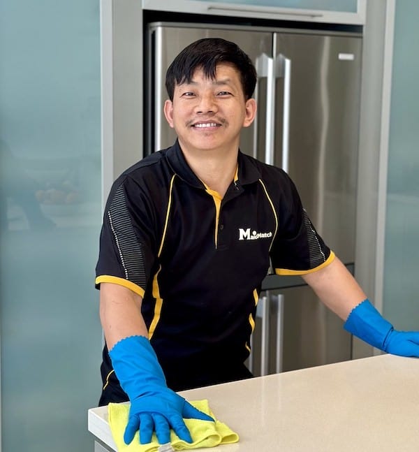 professional cleaner Ugyen smiling