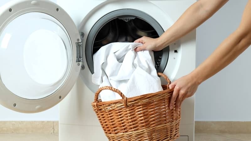 washing the sheets in the washing machine