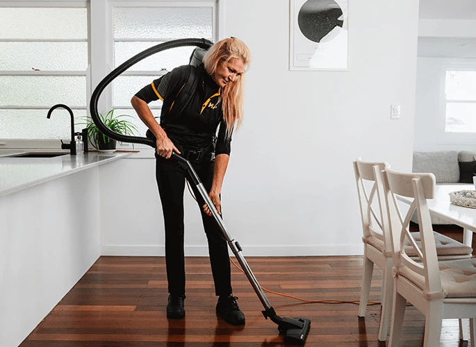 Vacuuming hardwood floors